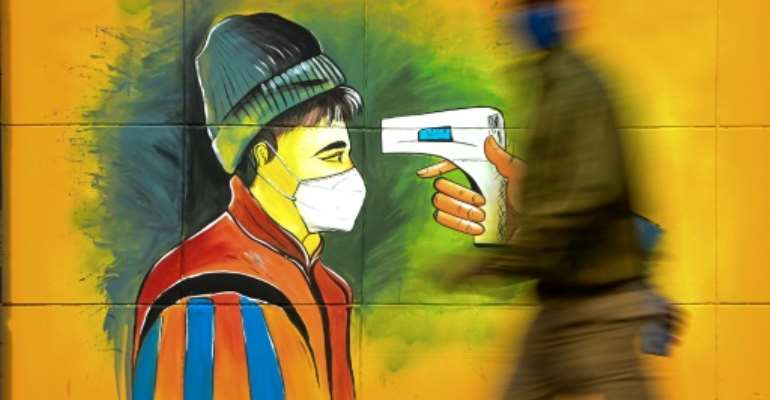 Hopes over Covid-19 vaccines have given a boost to virus-weary citizens across the globe in recent days. By John Cairns (University of Oxford/AFP)