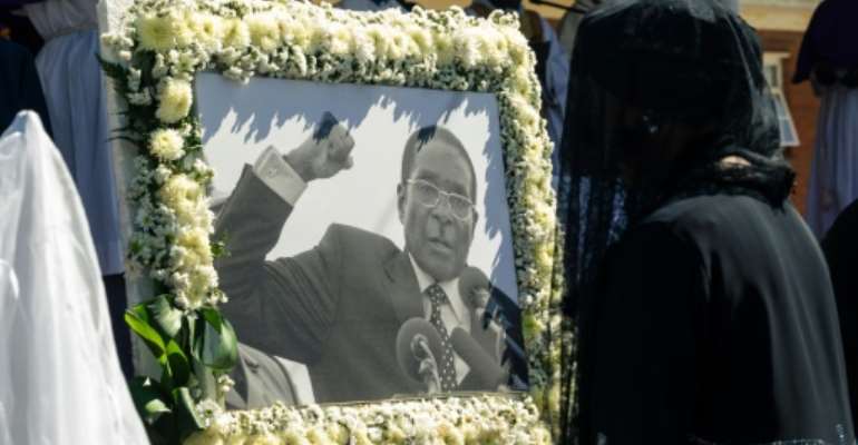 Hundreds of mourners assembled for the ceremony. By Jekesai NJIKIZANA (AFP)
