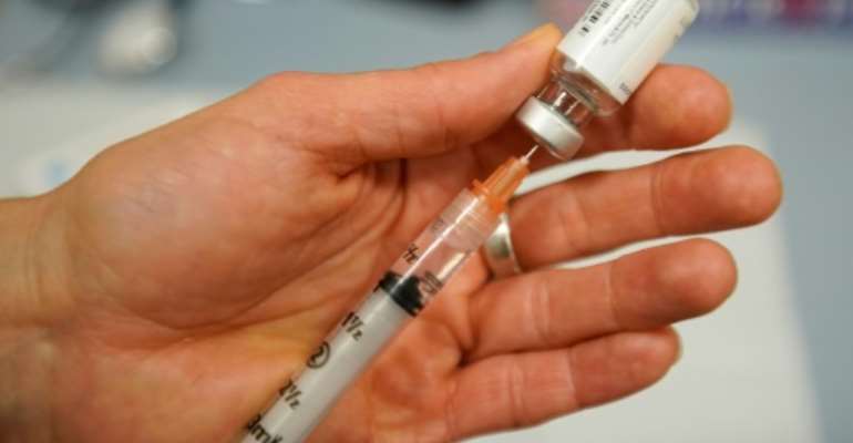 In 2019, more than 18 million children under the age of 5 were vaccinated across the DR Congo, the WHO said. By GEORGE FREY (GETTY IMAGES NORTH AMERICA/AFP)