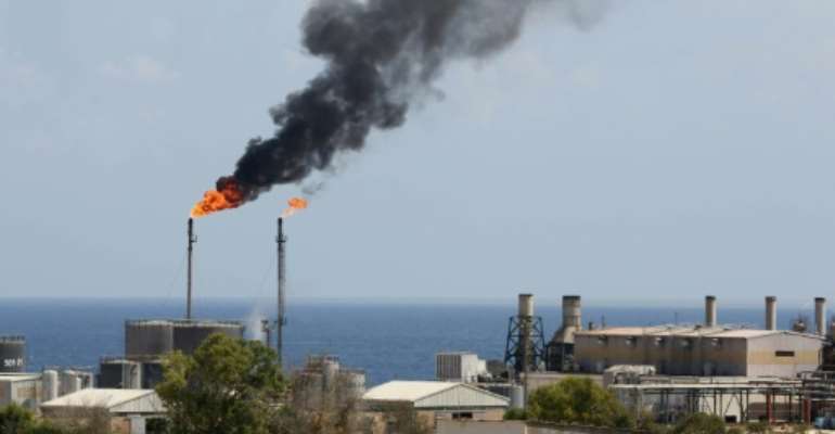 In this file photo taken on August 22, 2013, a general view shows the Libyan oil installation at Zawiya. By Mahmud TURKIA (AFP/File)