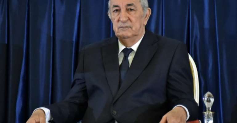 In this file photo taken on December 19, 2019, Abdelmadjid Tebboune is seen during his formal swearing-in ceremony as Algerian president. Tebboune was admitted to hospital in Germany on October 28 and has tested positive for coronavirus. By RYAD KRAMDI (AFP/File)