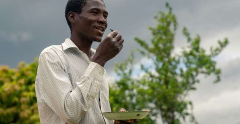 In Zimbabwean towns food tastes have become westernised, but in the countryside there remains a time-honoured tradition of eating insects. By Jekesai NJIKIZANA (AFP)
