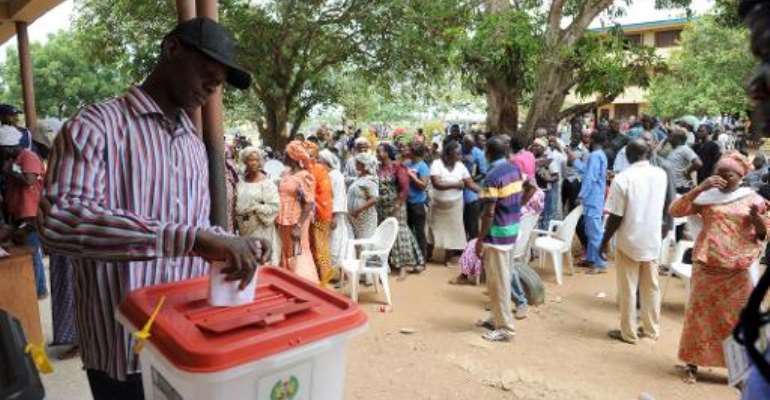 A man casts his vote at the Epe district of Lagos, Nigeria, on April 11, 2015. By Pius Utomi Ekpei (AFP/File)