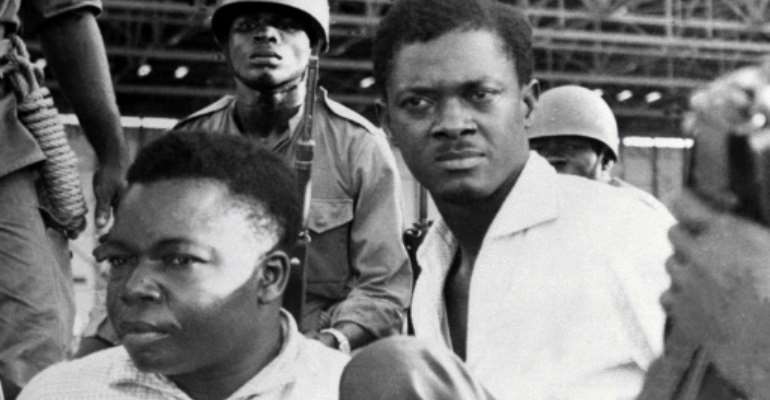 Independent Congo's first prime minister, Patrice Lumumba, right, pictured after being seized by troops in December 1960. To the left is Joseph Okito, the vice president of the Senate, who would also be murdered. By STRINGER (AFP/File)