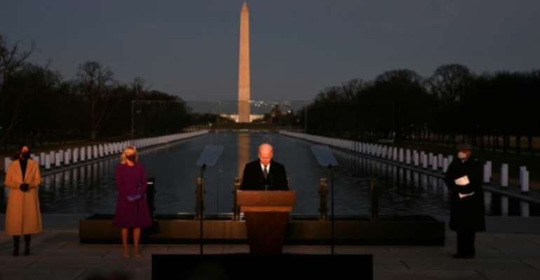 Joe Biden, a fierce critic of his predecessor's approach to the virus, launched a massive plan to get the contagion under control on his first day in office. By Jim WATSON (AFP)