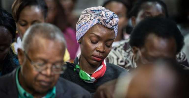 Hundreds gather for an Easter service at the All Saints' Cathedral in Nairobi on April 5, 2015, mourning one of the country's worst ever massacres. By Nichole Sobecki (AFP)