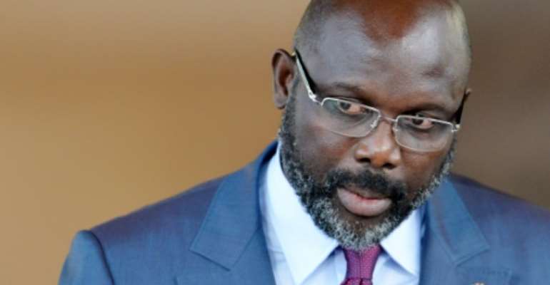 Liberia's President George Weah was elected in December on an anti-poverty ticket. By SIA KAMBOU (AFP/File)
