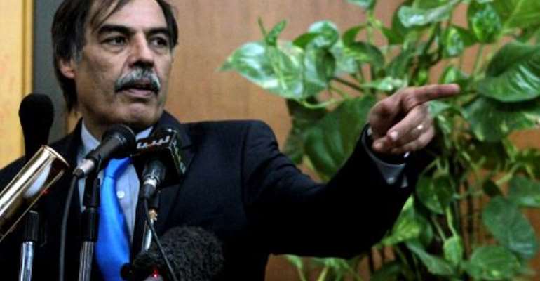Libyan politician Ali Tarhuni, seen at a press conference in the eastern city of Benghazi on October 25, 2011. By Abdullah Doma (AFP/File)