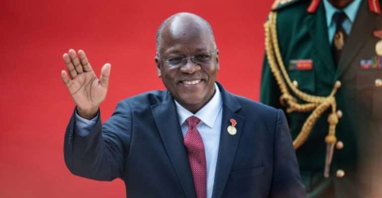 Magufuli's supporters praise an energetic infrastructure drive as well as a shake-up in the mining industry. By Michele Spatari (AFP)