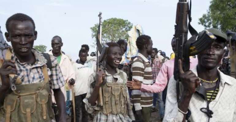 Members of the White Army, a South Sudanese anti-government militia, attend a rally in Nasir on April 14, 2014. By Zacharias Abubeker (AFP/File)