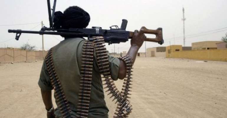 A Malian government soldier patrols in the north. By Kambou Sia (AFP/File)