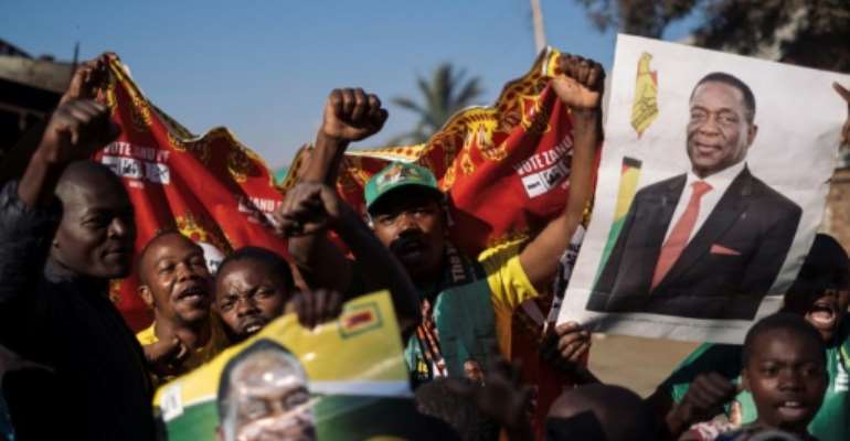 Mnangagwa's supporters celebrated his election victory. By MARCO LONGARI (AFP)