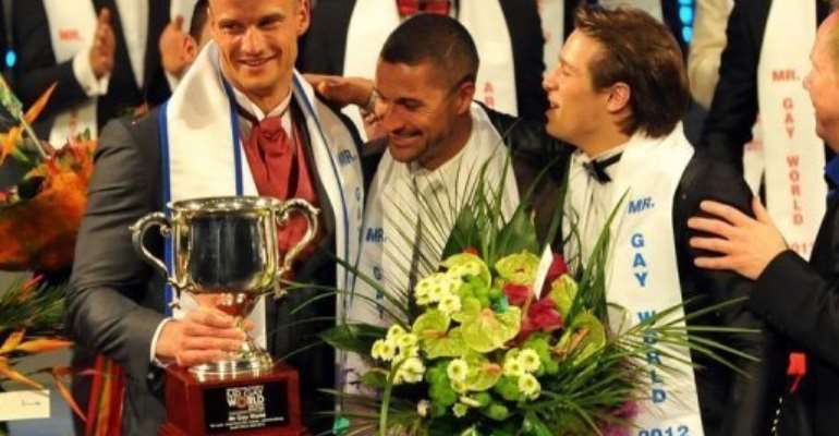 Andreas Derleth (L), a German who lives in New Zealand, took the Mr Gay World title late Sunday. By Alexander Joe (AFP)