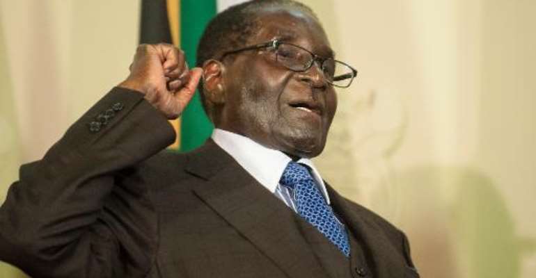 Mugabe lambasts West on visit to S.Africa