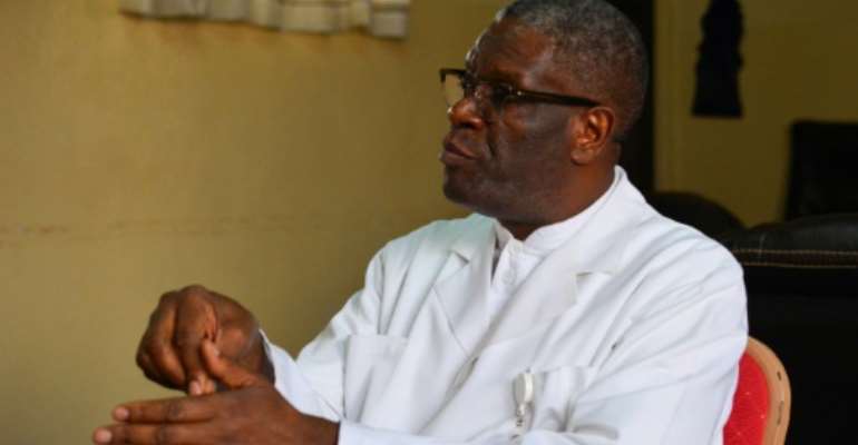 Mukwege received the Nobel Peace Prize for his work in reconstructive surgery for female victims of sexual violence during armed conflicts in eastern DR Congo. By Alain WANDIMOYI (AFP)