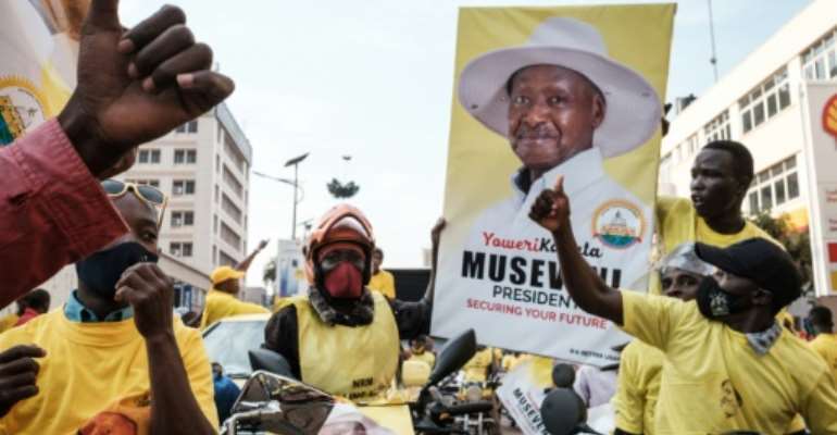 Museveni supporters in Kampala celebrated after his victory was announced on Saturday. By Yasuyoshi CHIBA (AFP)