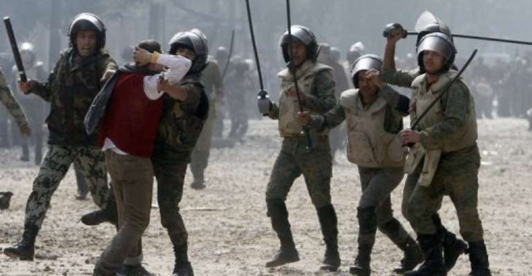 Violence erupted after a protester said he had been arrested by soldiers and beaten up. By Mohammed Abed (AFP)