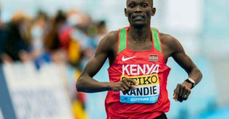New men's half marathon record holder Kandie. By MATEUSZ SLODKOWSKI (AFP)