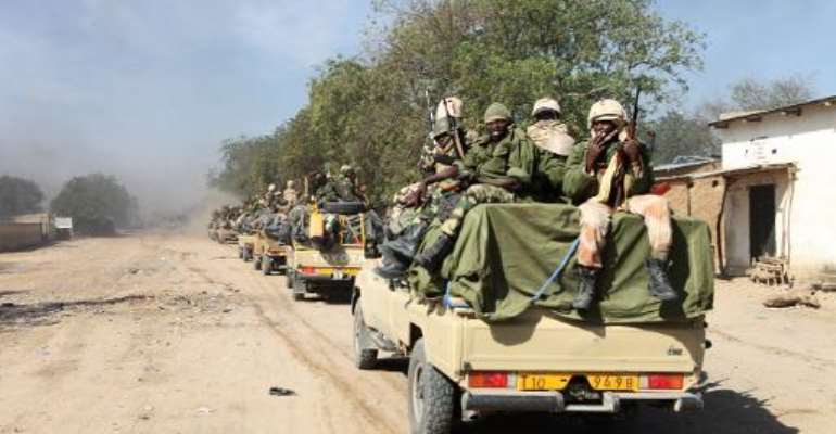 Chadian soldiers patrol in the Nigerian border town of Gamboru after taking control of the city, February 4, 2015. By Stephane Yas (AFP/File)