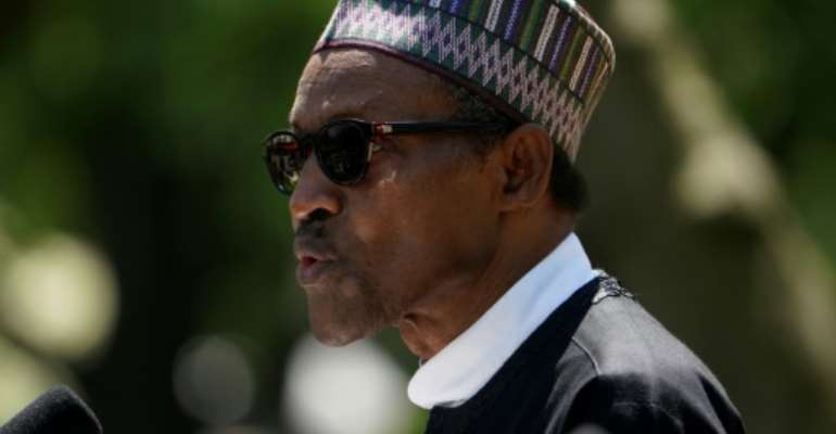 Nigeria's President Muhammadu Buhari is said to be experiencing tensions with his main political backer, but the leader played down internal disagreements within the party. By Mandel NGAN (AFP/File)