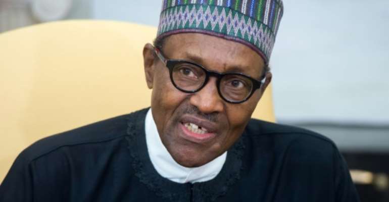 Nigeria's President Muhammadu Buhari, seen during a visit to Washington in April, made the creation of a new national airline a key election campaign promise three years ago. By SAUL LOEB (AFP/File)