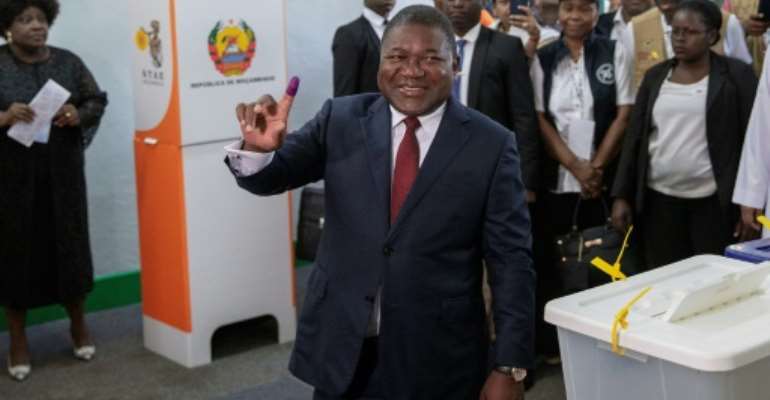 Nyusi is forecast to win a second five-year term despite his popularity taking a hit from chronic unrest and a financial crisis linked to alleged state corruption. By GIANLUIGI GUERCIA (AFP)
