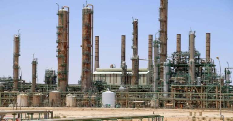 Oil-rich Libya has been torn apart by civil war since the NATO-backed uprising that ousted long-time dictator Moamer Kadhafi in 2011, with an array of militias filling the vacuum and civilian bodies struggling to impose their authority. By - (AFP/File)