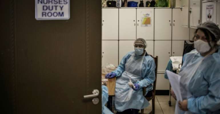 On the front line: More than 24,000 health workers in South Africa have been infected by coronavirus. By MARCO LONGARI (AFP)