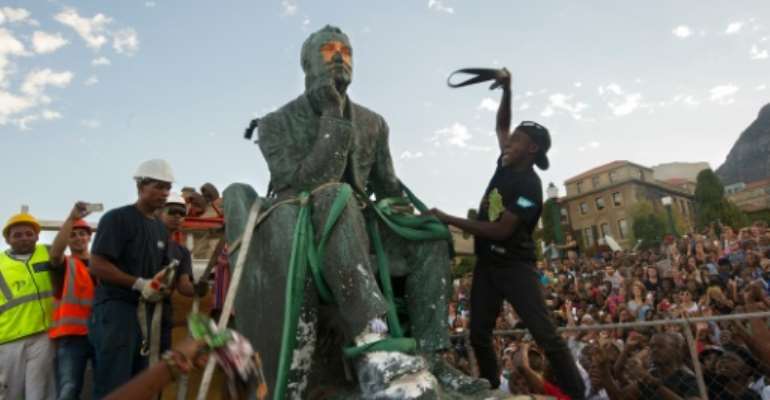 A popular movement at the University of South Africa forced the removal of a statue of British colonialist Cecil Rhodes. By Rodger Bosch (AFP/File)