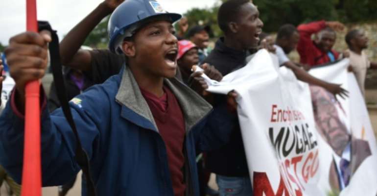 People called for Zimbabwe's president Robert Mugabe to step down during a demonstration in Harare. By - (AFP)