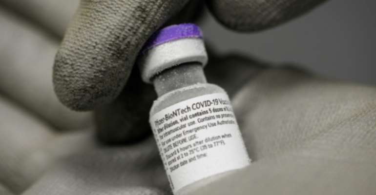 Pharma giant Pfizer is trying to ease concern in Europe about the deliveries of the coronavirus vaccine it developed with German firm BioNTech. By JEAN-FRANCOIS MONIER (AFP/File)
