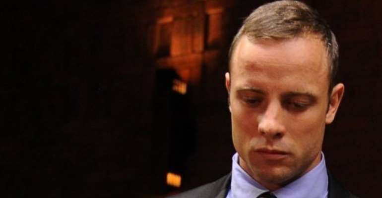 Oscar Pistorius appears at the Magistrate Court in Pretoria on February 21, 2013. By Alexander Joe (AFP/File)