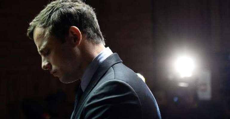 South African Paralympic sprinter Oscar Pistorius appears at the Magistrate Court in Pretoria on August 19, 2013. By Stephane de Sakutin (AFP/File)