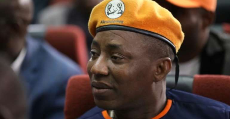Police who arrested Nigerian opposition leader Omoyele Sowore - here in February 2020 -