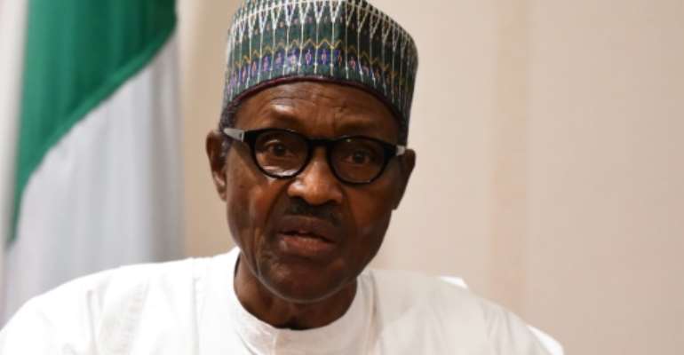 President Muhammadu Buhari's party has seen a wave of defections in protest at his leadership style and a surge in opposition PDP contenders that could give it momentum. By PIUS UTOMI EKPEI (AFP/File)