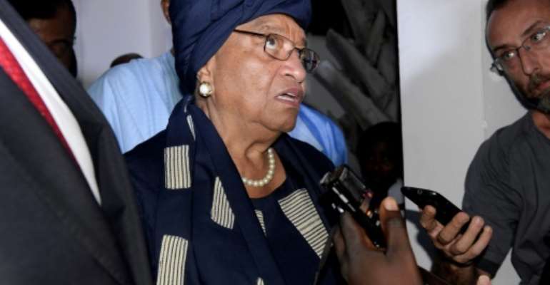 President of Liberia Ellen Johnson Sirleaf led a heavyweight delegation to The Gambia to seek to broker a deal, meeting both Jammeh and Barrow. By Seyllou (AFP/File)