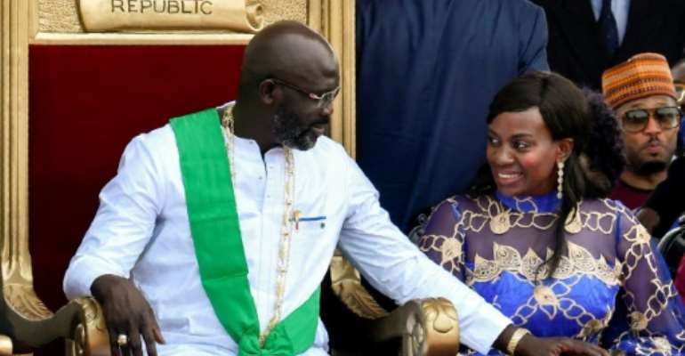 President Weah and his wife Clar, pictured at his inauguration in January 2018. By ISSOUF SANOGO (AFP)