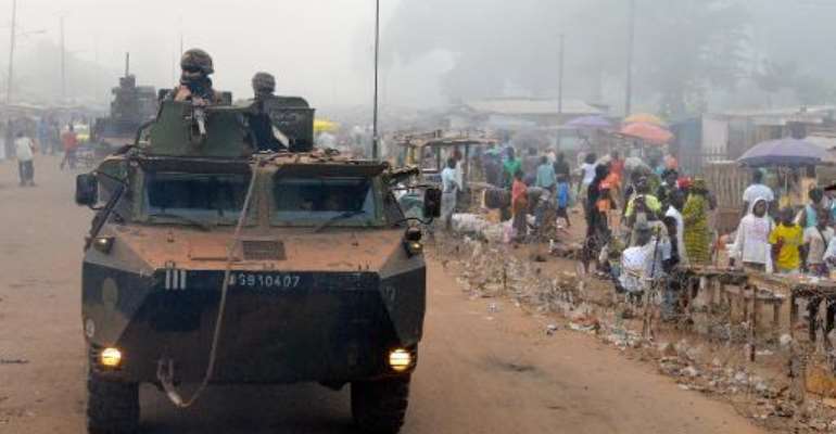 French soldiers patrol in Bangui, Central African Republic on December 4, 2014. By Pacome Pabandji (AFP)