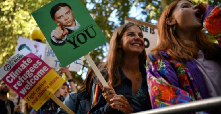 Protesters hit the streets from London to the Pacific. By Ben STANSALL (AFP)