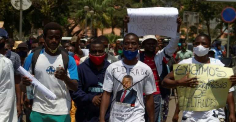 Protesters took to the streets in Angola's capital Luanda to denounce high-level corruption. By Osvaldo Silva (AFP)