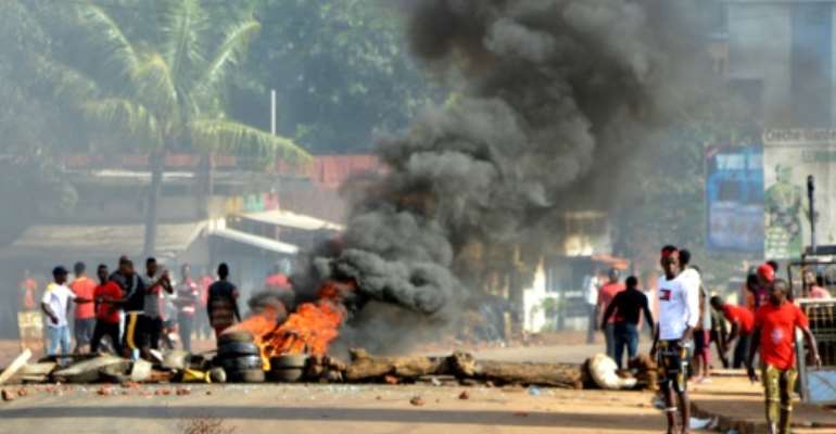 Protests have rocked Conakry and other cities earlier this month over Conde's bid to overturn term limits and run again. By CELLOU BINANI (AFP)