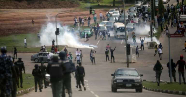 Protests that began 12 days ago over abuses by the Nigerian police's loathed Special Anti-Robbery Squad (SARS) have spiralled dramatically . By Kola Sulaimon (AFP/File)