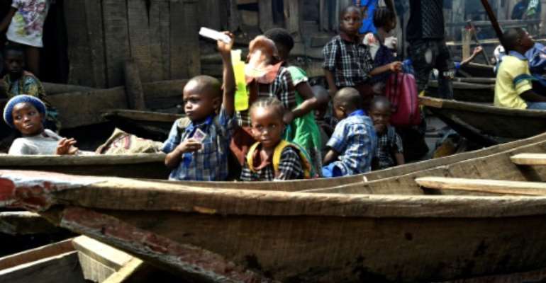 Reeling from the coronavirus pandemic, seven million more people in Nigeria are estimated to fall into poverty this year. By PIUS UTOMI EKPEI (AFP)