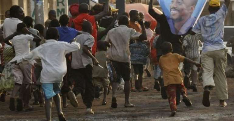 Joseph Kabila's supporters celebrate in Goma on December 9 after he was declared re-elected. By Simon Maina (AFP/File)