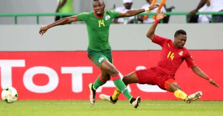 Renaissance Berkane match-winner Issoufou Dayo (L) playing for Burkina Faso against Ghana in the 2017 Africa Cup of Nations. By Steeve JORDAN (AFP/File)