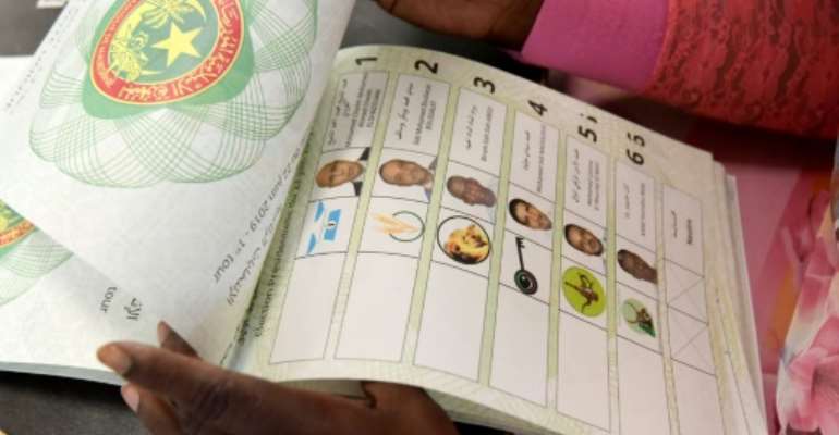 Results showed ruling party candidate Mohamed Ould Ghazouani winning Saturday's election with 52 percent of the vote.. By Sia KAMBOU (AFP/File)