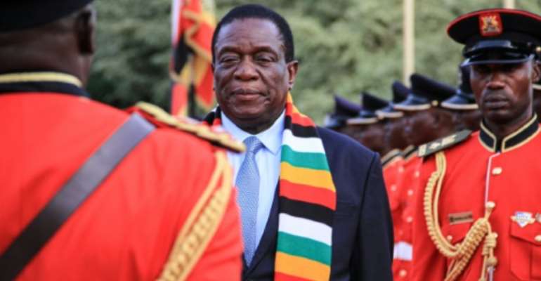 Rights groups claim the new Zimbabwe government, headed by President Emmerson Mnangagwa, has committed abuses. By Tina SMOLE (AFP)