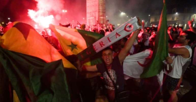 Riotous celebrations erupted around France after the Algerian football team qualified for the final of the Africa Cup of Nations. By MEHDI FEDOUACH (AFP)