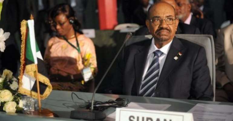 Omar al-Bashir at the African Union Summit on health in Abuja on July 15, 2013. By Pius Utomi Ekpei (AFP)