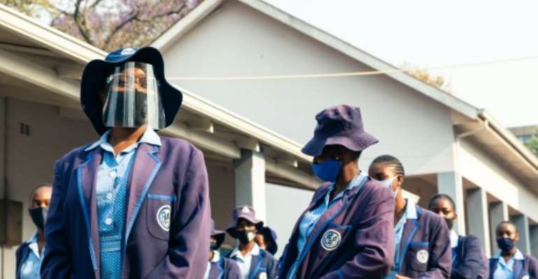 Zimbabwe teachers strike as schools reopen after virus ...